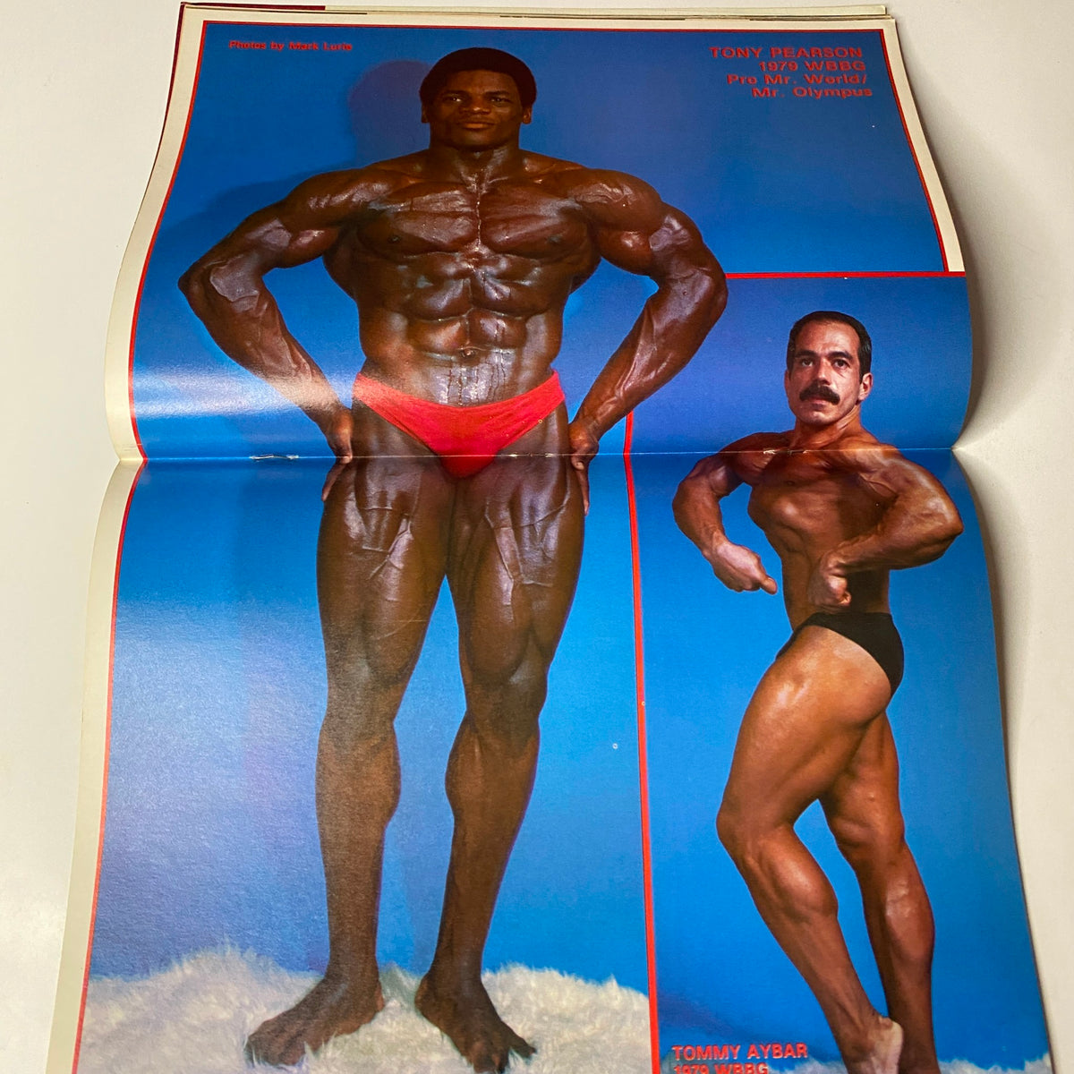 Centerfold from Muscle Training Illustrated May 1981 featuring bodybuilding champions Tony Bradan and Tommy Aybar posed prominently, showcasing physique and muscle training techniques.