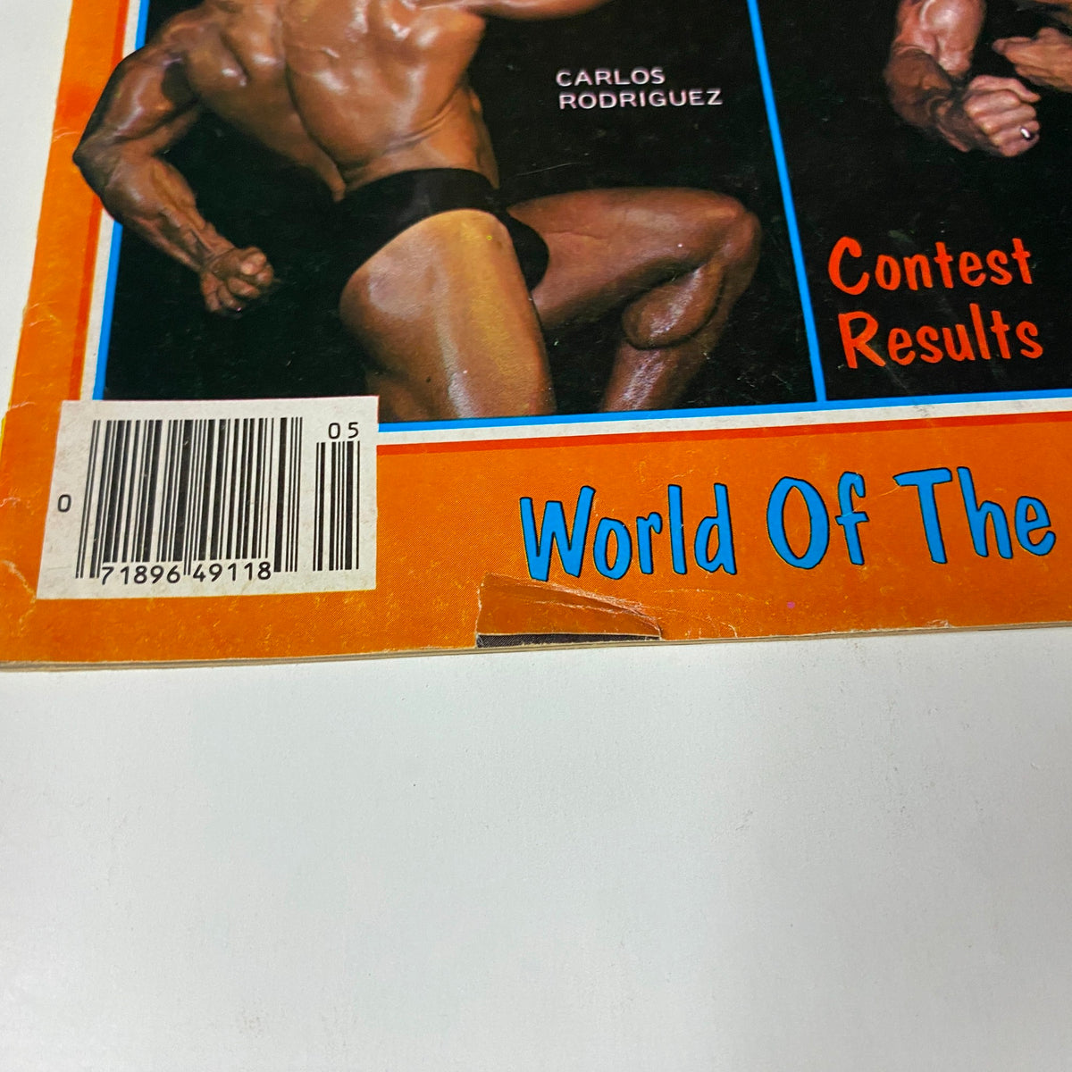 Close-up of the magazine cover of Muscle Training Illustrated May 1981 showing Carlos Rodriguez's name, bar code, and magazine details.