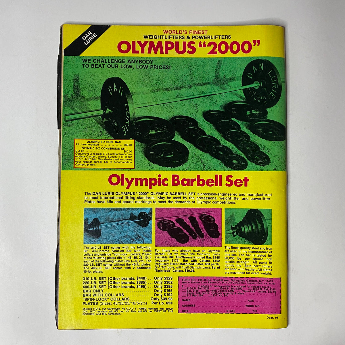 Advertisement in Muscle Training Illustrated April 1982 No. 98 for the Dan Lurie Olympic Barbell Set, highlighting weightlifting equipment.
