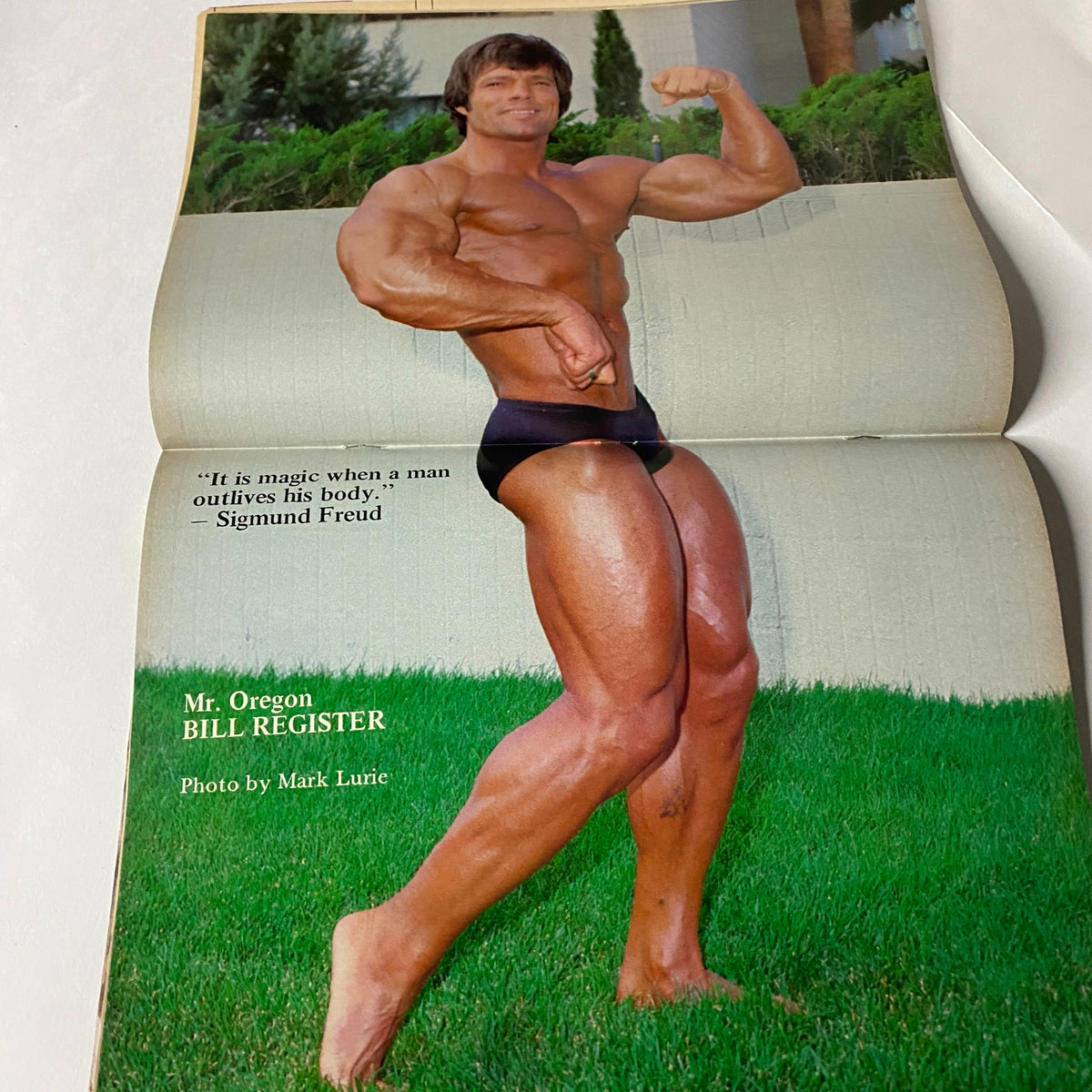 Muscle Training Illustrated August 1982 No. 100 featuring Mr. Oregon Bill Register posing in athletic stance, showcasing muscular physique on a green lawn, emphasizing strength and bodybuilding aesthetics.