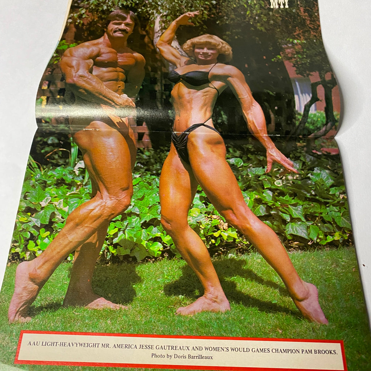Centerfold from Muscle Training Illustrated, March 1983, showcasing AAU Light-Heavyweight Mr. America Jesse Gauthreaux and Women’s World Games Champion Pam Brooks in a bodybuilding pose.