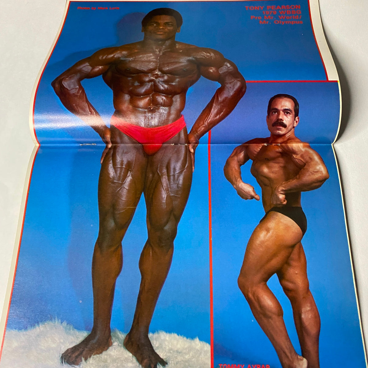 Centerfold from Muscle Training Illustrated March 1980 showcasing bodybuilders Tony Pearson and Tommy Ayers in classic poses, highlighting their physiques in vibrant color.