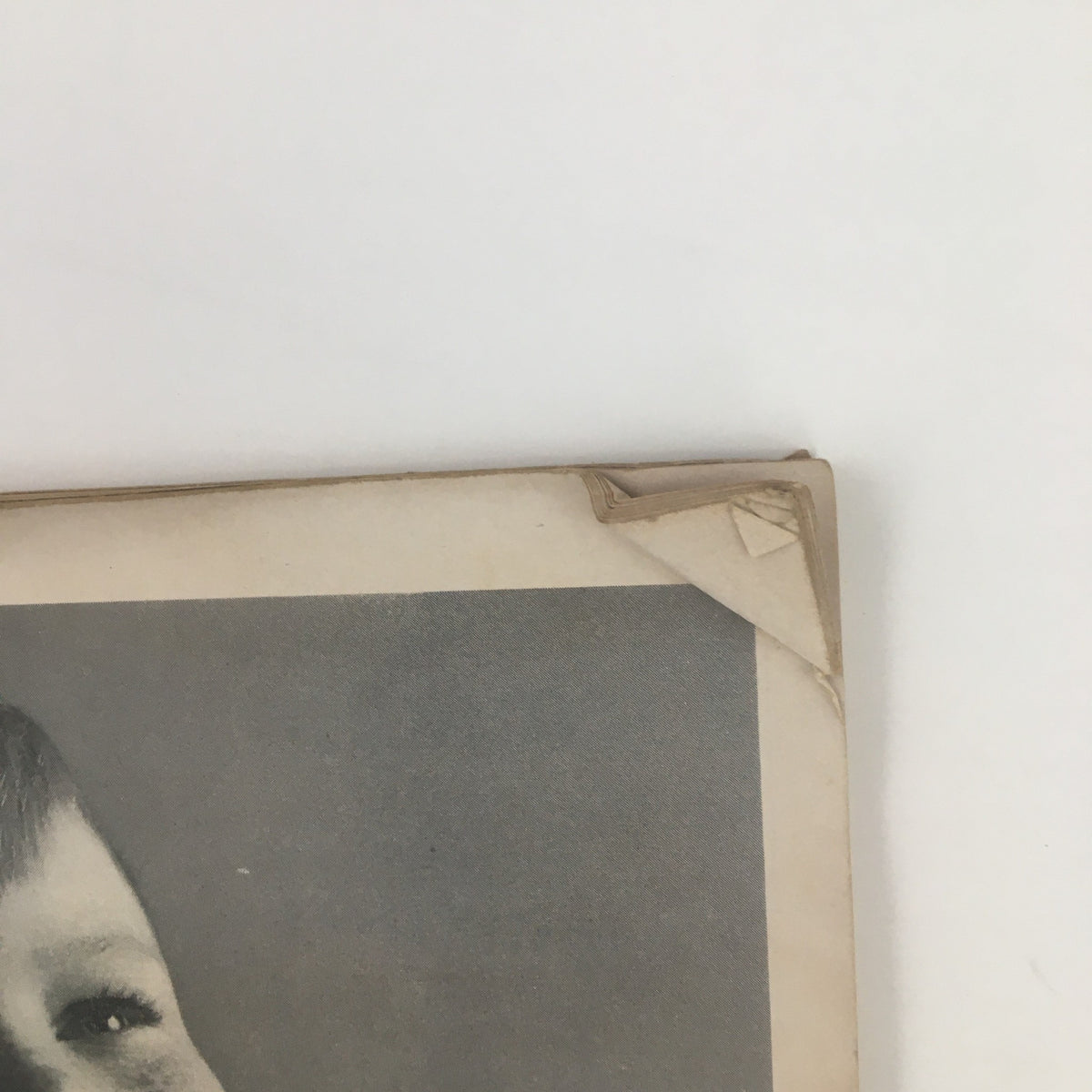 Close-up of a smiling child from McCall's Magazine September 1955, displaying typical vintage style photography with a timeless expression.