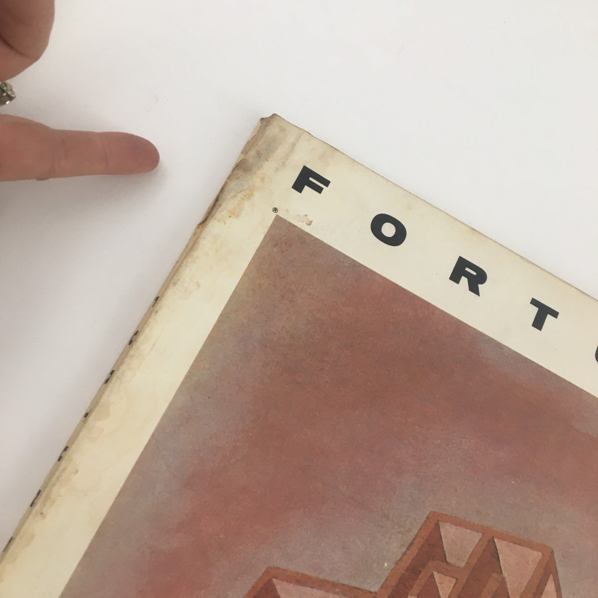 Close-up of the top section of the Fortune Magazine January 1966 cover, indicating some wear. The magazine emphasizes 'Color TV's Embattled Future', blending art and history in its design.
