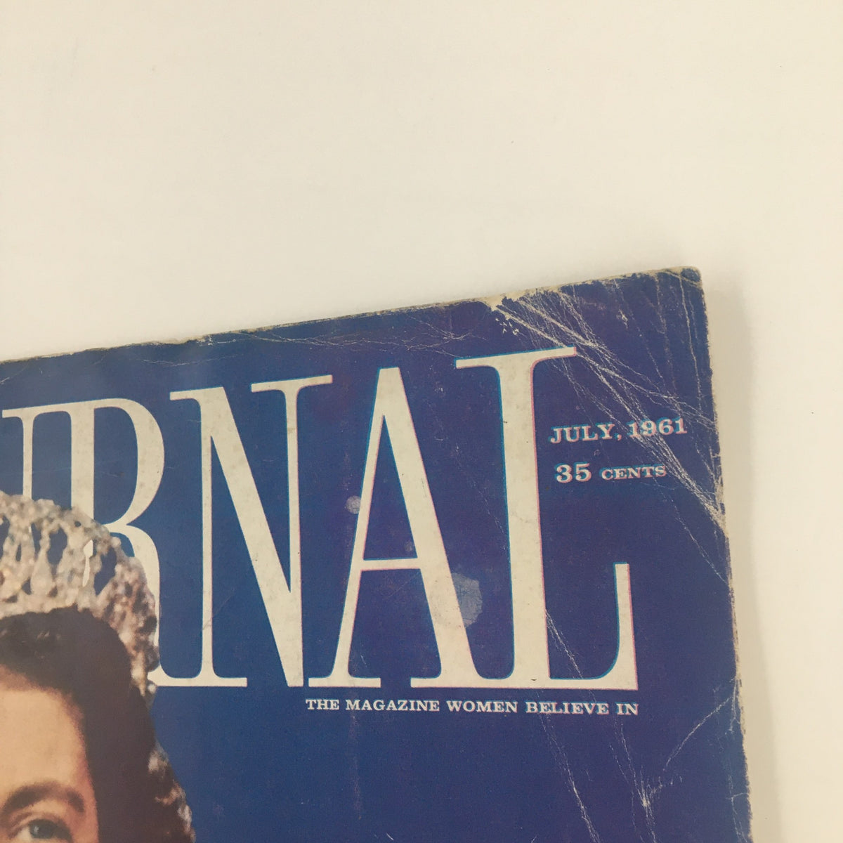 Cover of Ladies' Home Journal Magazine July 1961 showcasing the title in blue with the date and price, featuring a vintage design that reflects early 1960s aesthetics.