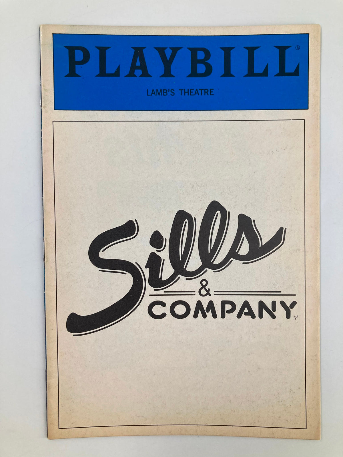 1986 Playbill for Lamb's Theatre featuring Sills & Company, showcasing a detailed cover with the title prominently displayed.