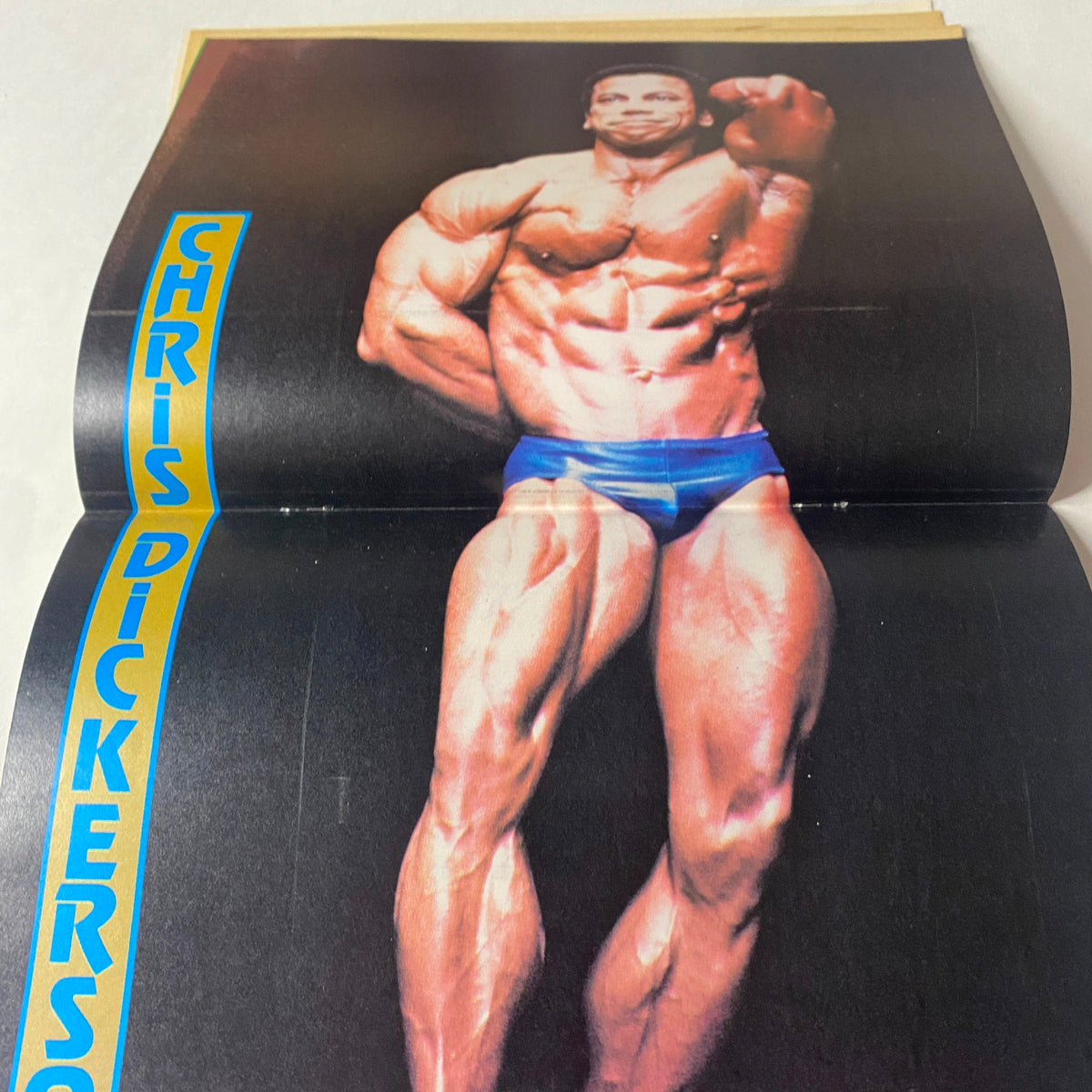 Centerfold from Muscle Up Magazine August 1980 Vol 2 No 6 showcasing Chris Dickerson in a striking bodybuilding pose highlighting his impressive physique.