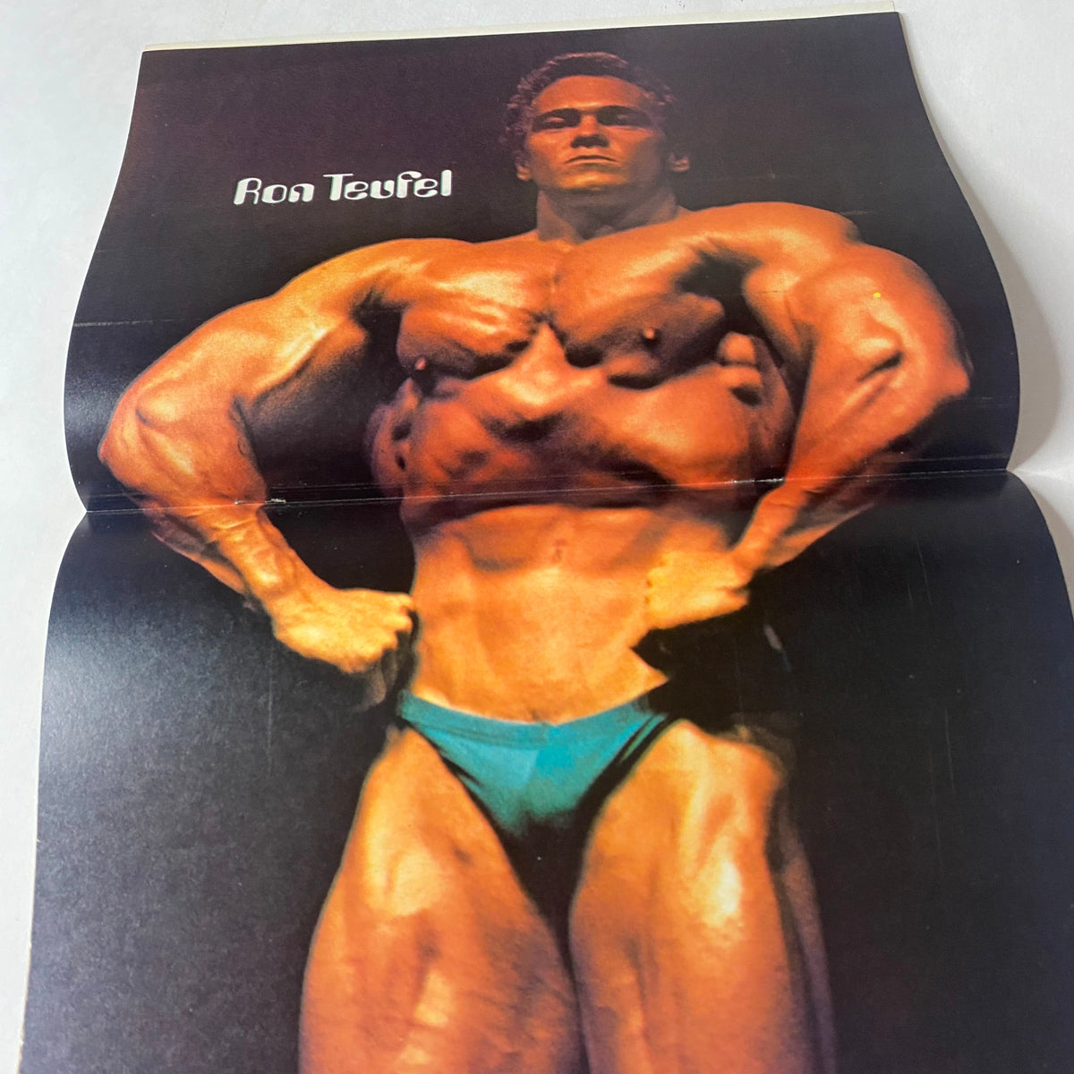 Centerfold of Muscle Up Magazine June 1981 Vol 3 No 11 featuring Ron Teufel, showcasing his impressive muscular build in a classic bodybuilding pose.