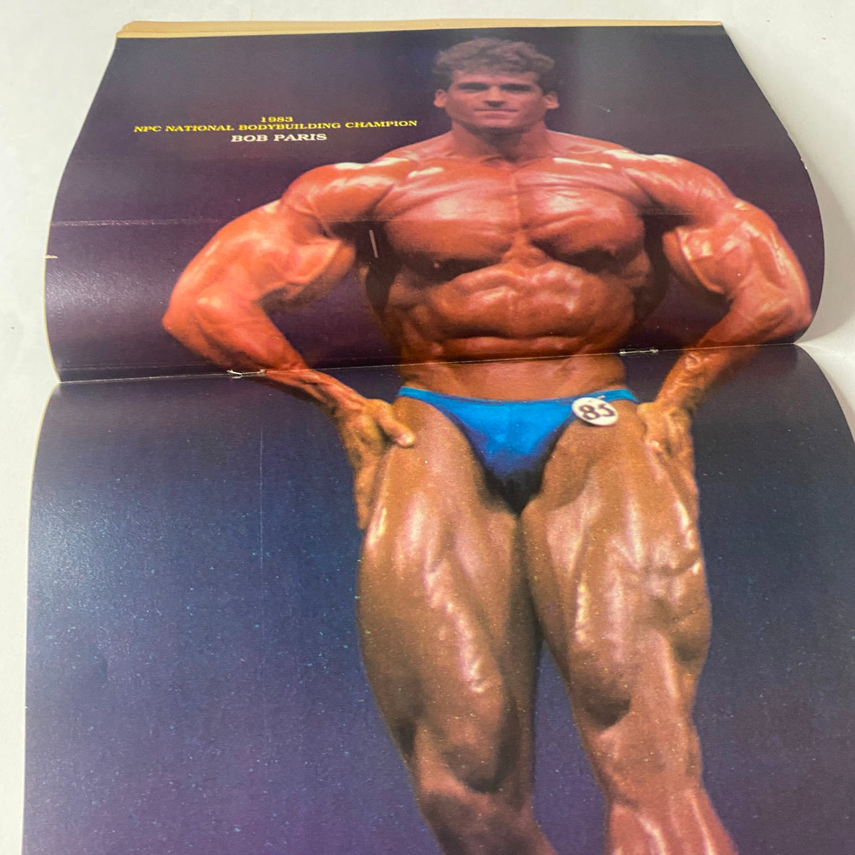 Centerfold of Bob Paris from Muscle Up Magazine June 1984 Vol. 6 No. 29, showcasing his physique during the 1983 NPC National Bodybuilding Championships.