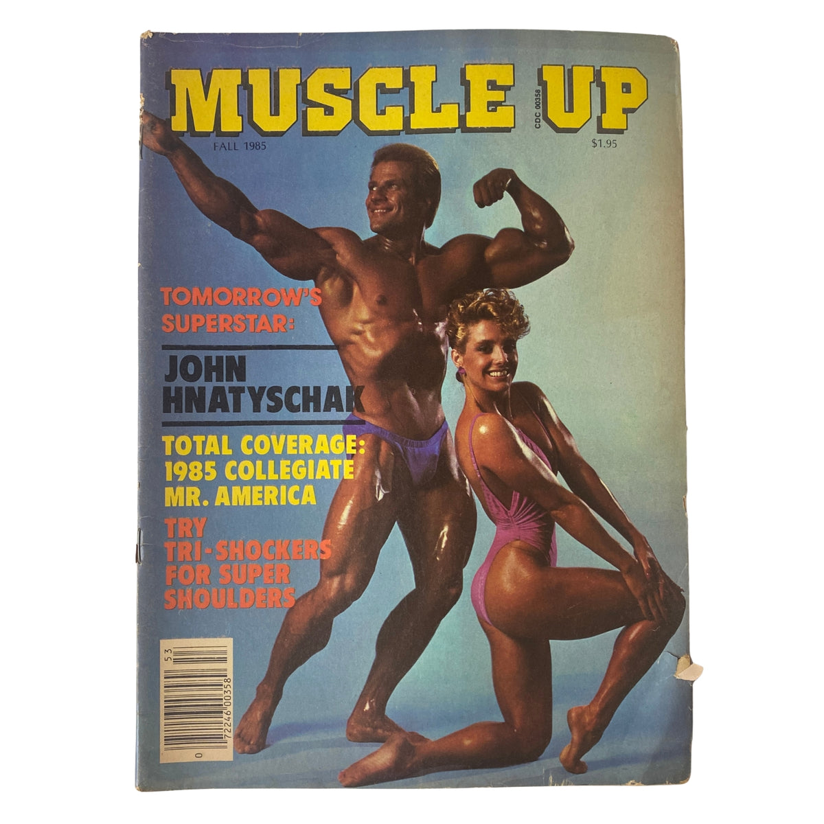 Cover of Muscle Up Magazine Fall 1985 featuring John Hnatyschak and Kerrie Keenan, highlighting Hnatyschak as Tomorrow's Superstar.