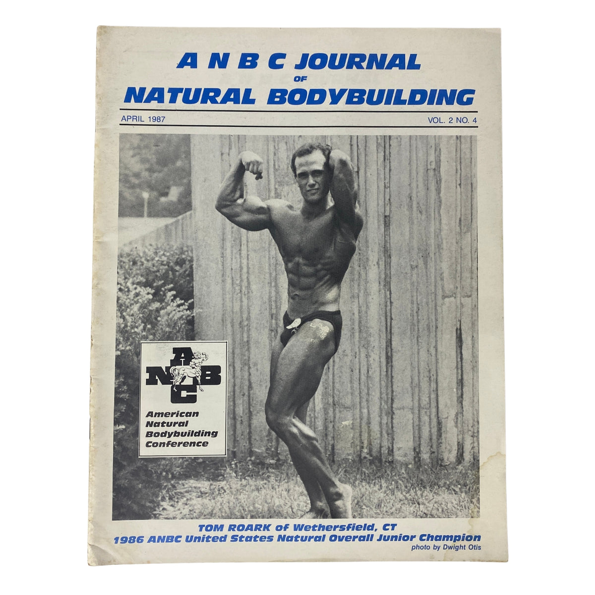 Front cover of the ANBC Journal of Natural Bodybuilding April 1987 Vol 2 No. 4 featuring Tom Roark in a bodybuilding pose.