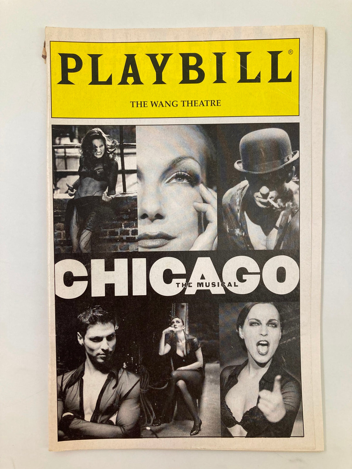 2003 Playbill for Chicago at the Wang Theatre featuring images of the cast and title prominently displayed.