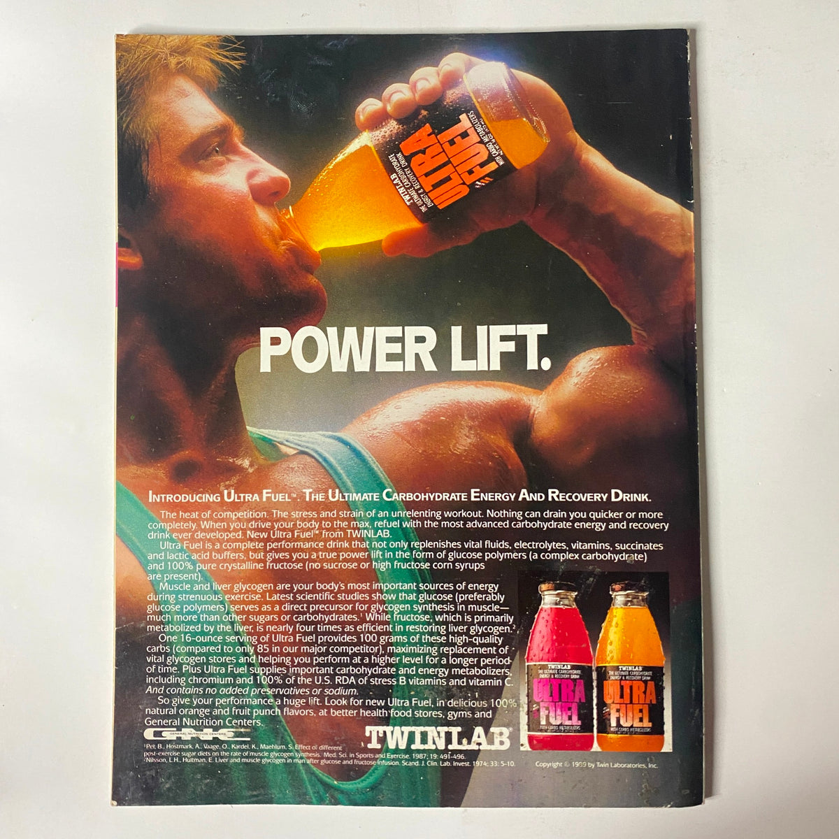 Back cover of Natural Body Fitness Magazine January 1990 advertising 'Ultra Fuel' energy drink with a muscular athlete, emphasizing fitness and recovery.
