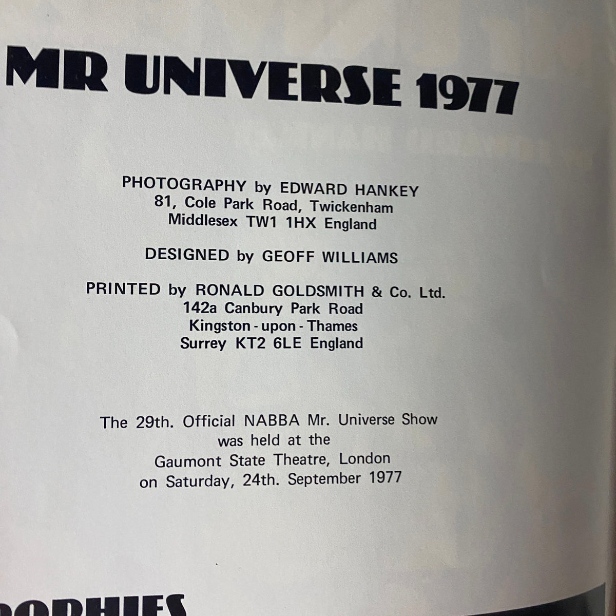 Publication details page from the 1977 NABBA Mr. Universe program by Edward Hankey, listing photography, printing, and event information.