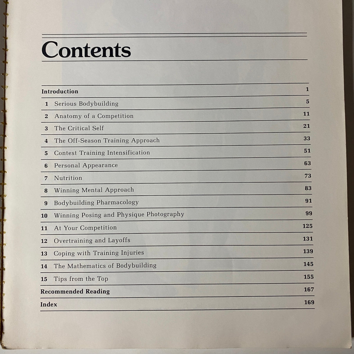 Inside page of the 1984 Competitive Bodybuilding book featuring the table of contents, outlining chapters on bodybuilding techniques and strategies.
