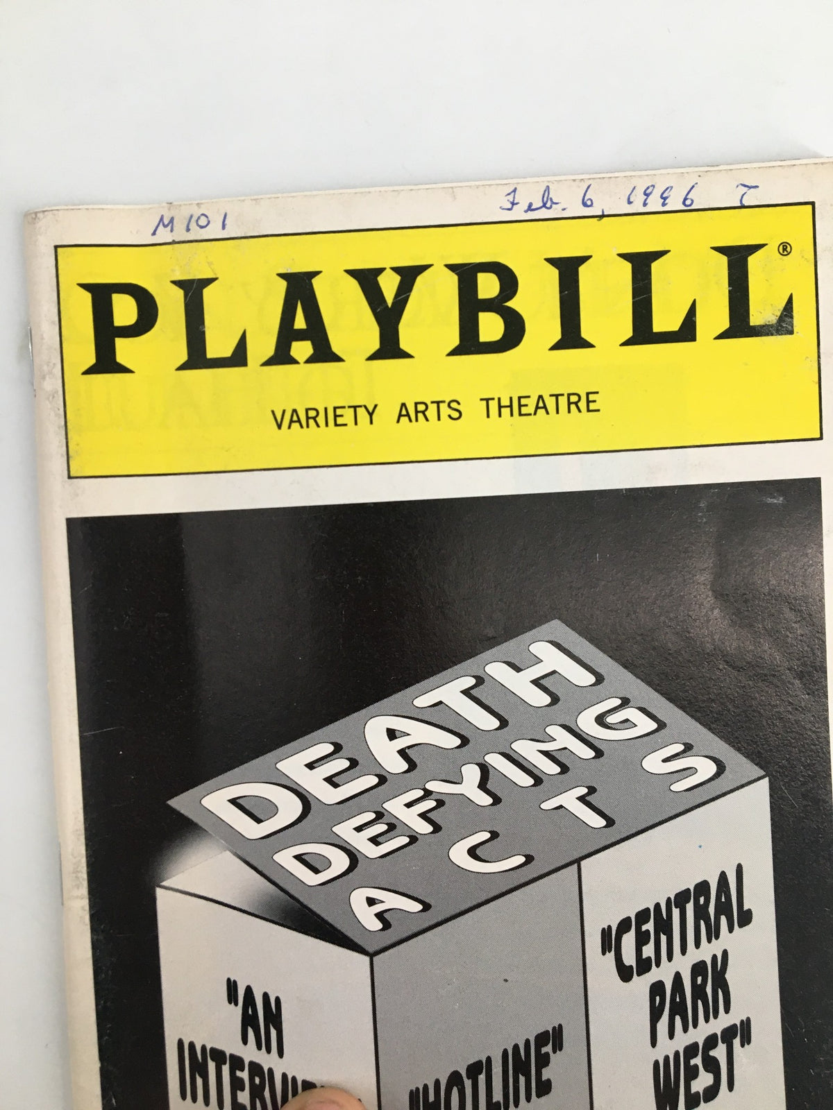 Close-up view of the 1996 Playbill variety arts theatre featuring Valerie Harper in Death Defying Acts, highlighting the show's title and details.