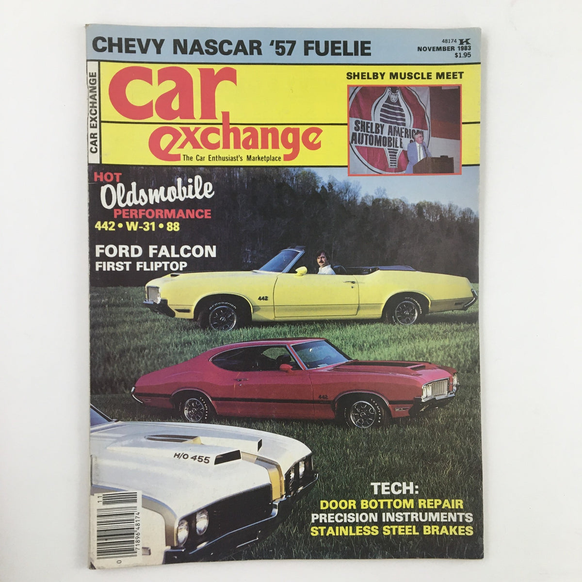 Car Exchange Magazine November 1983 featuring Oldsmobile and Ford Falcon Fliptop on the cover, showcasing classic cars and automotive performance insights.