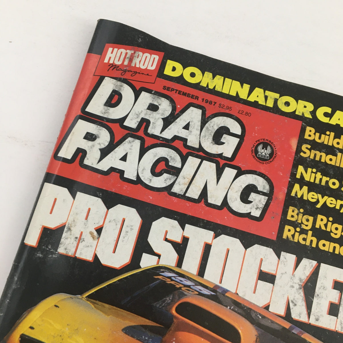 Close-up of the Hot Rod Magazine September 1987 cover showing the title 'Drag Racing' prominently, with highlights of articles about Billy Meyer and Bill Mullins.
