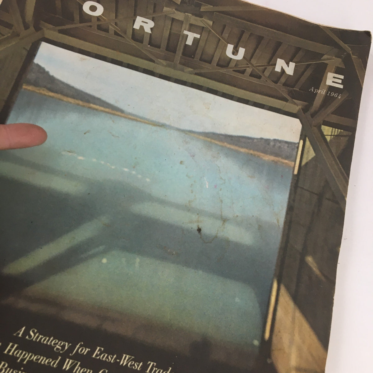 Cover of Fortune Magazine April 1964 featuring the title 'Fortune' and a scenic view, illustrating the theme 'What Happened When Conoco Went Abroad'.