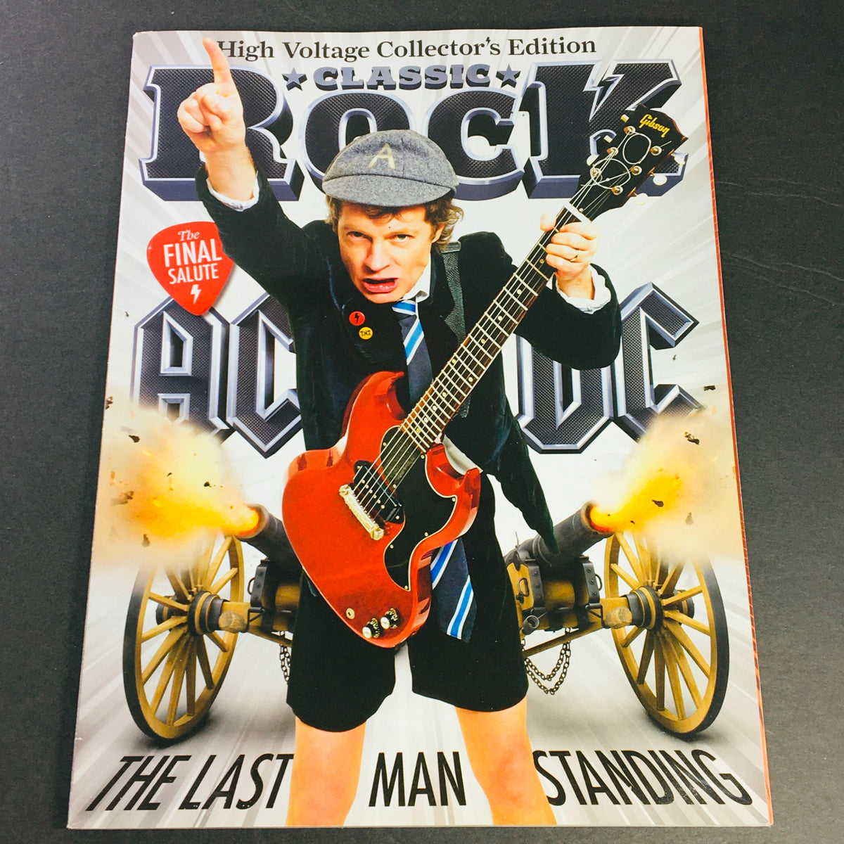 Cover of Classic Rock Magazine June 2016 #223 featuring AC/DC and Rick Wakeman, showcasing vibrant artwork and iconic imagery representing classic rock history.