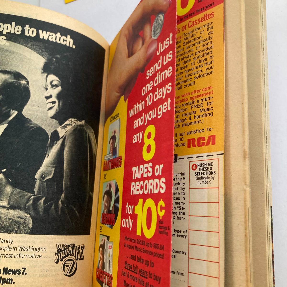 Interior advertisement from TV Guide Magazine April 17 1976 offering a promotion for music tapes or records with a featured image of a hand holding a coin, alongside promotional text detailing the offer.
