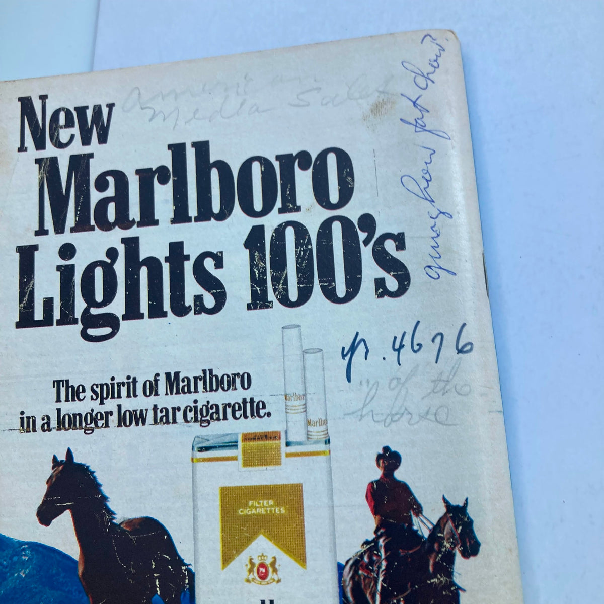 Advertisement for Marlboro Lights 100's in TV Guide Magazine February 4, 1978, with a cowboy and horse, showcasing cigarette products.