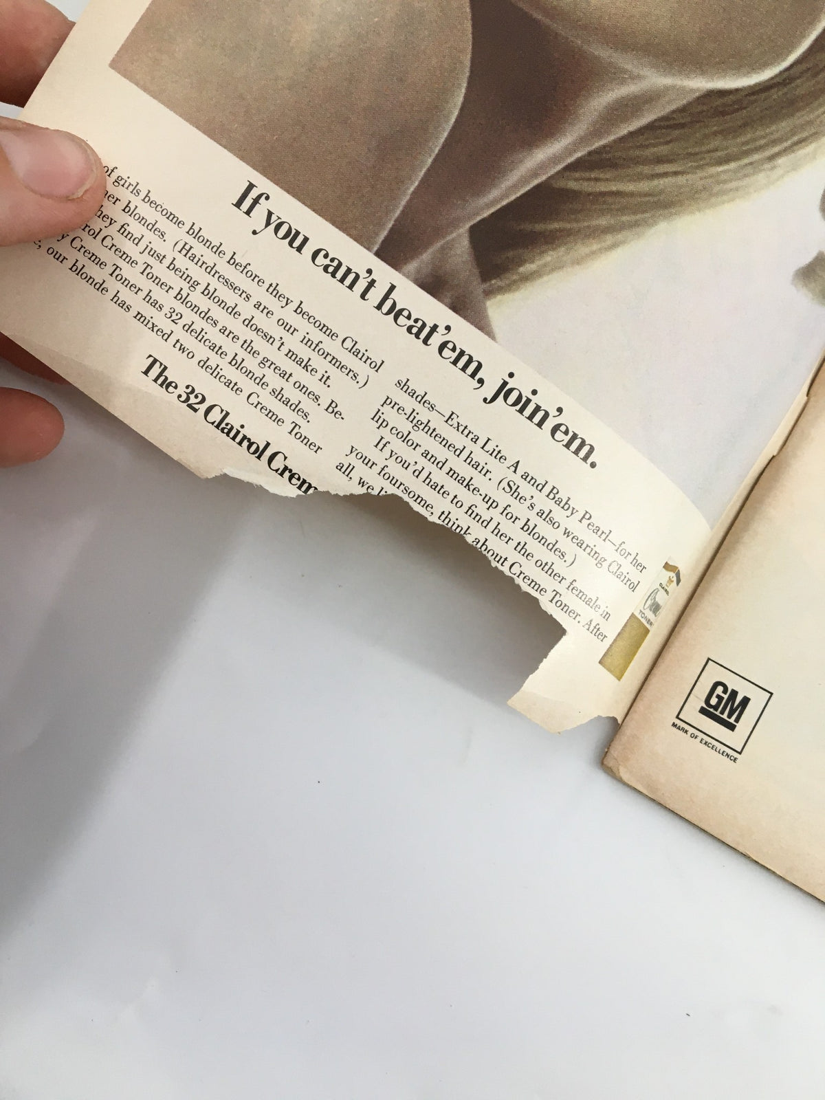 Inside page of the 1967 Playbill for Don't Drink The Water displaying a visible tear and advertisement.