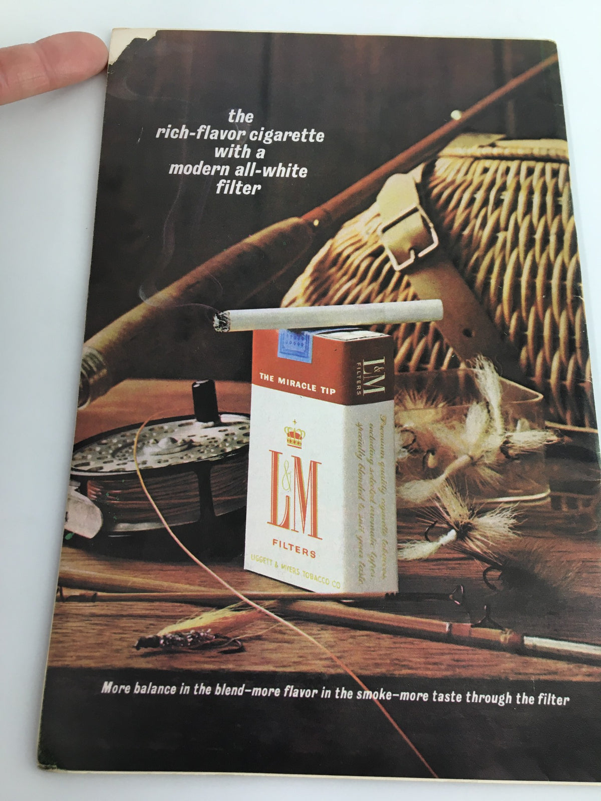 Back cover advertisement of the 1964 Playbill for Biltmore Theatre, promoting Gilbey's Gin alongside a cigarette ad.