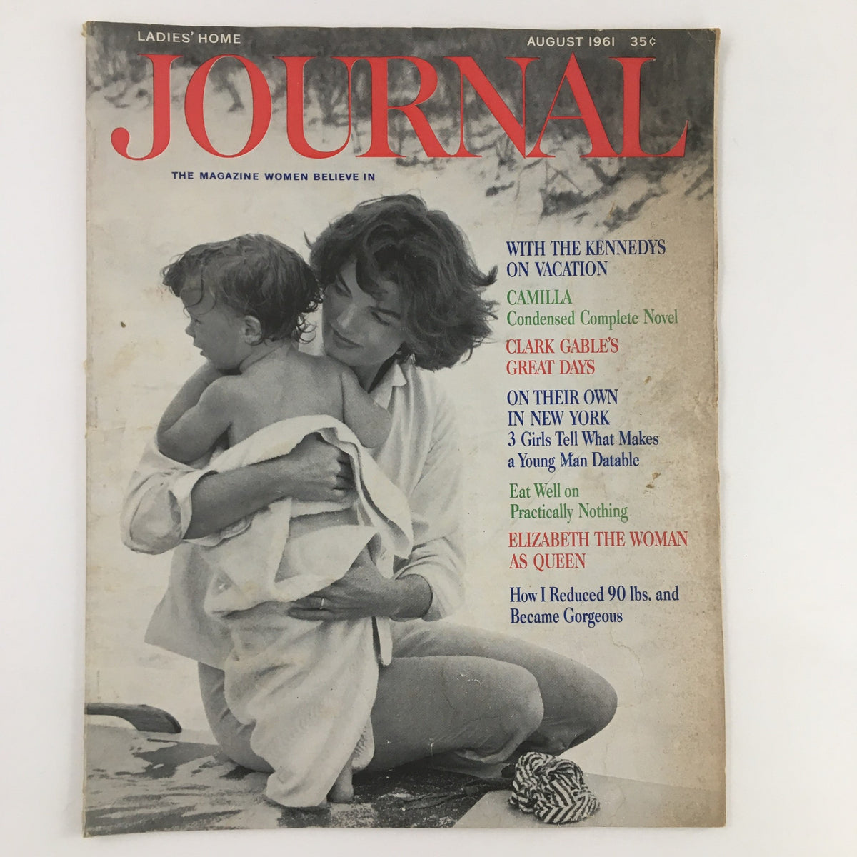 Cover of Ladies' Home Journal Magazine August 1961 featuring Jackie Kennedy on vacation with child, showcasing vintage style and cultural significance.