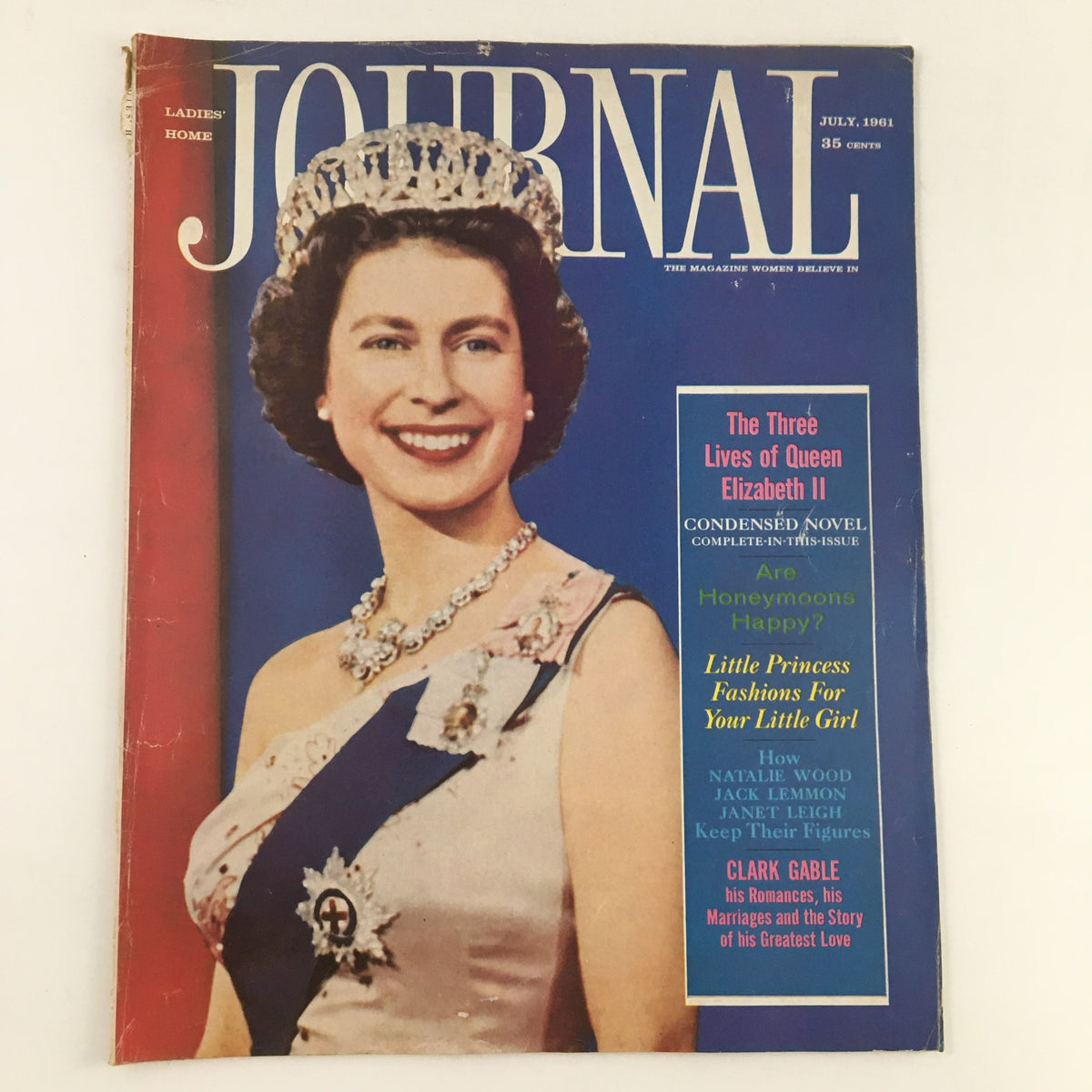 Ladies' Home Journal Magazine cover from July 1961 featuring Queen Elizabeth II, highlighting cultural and royal themes of the era.