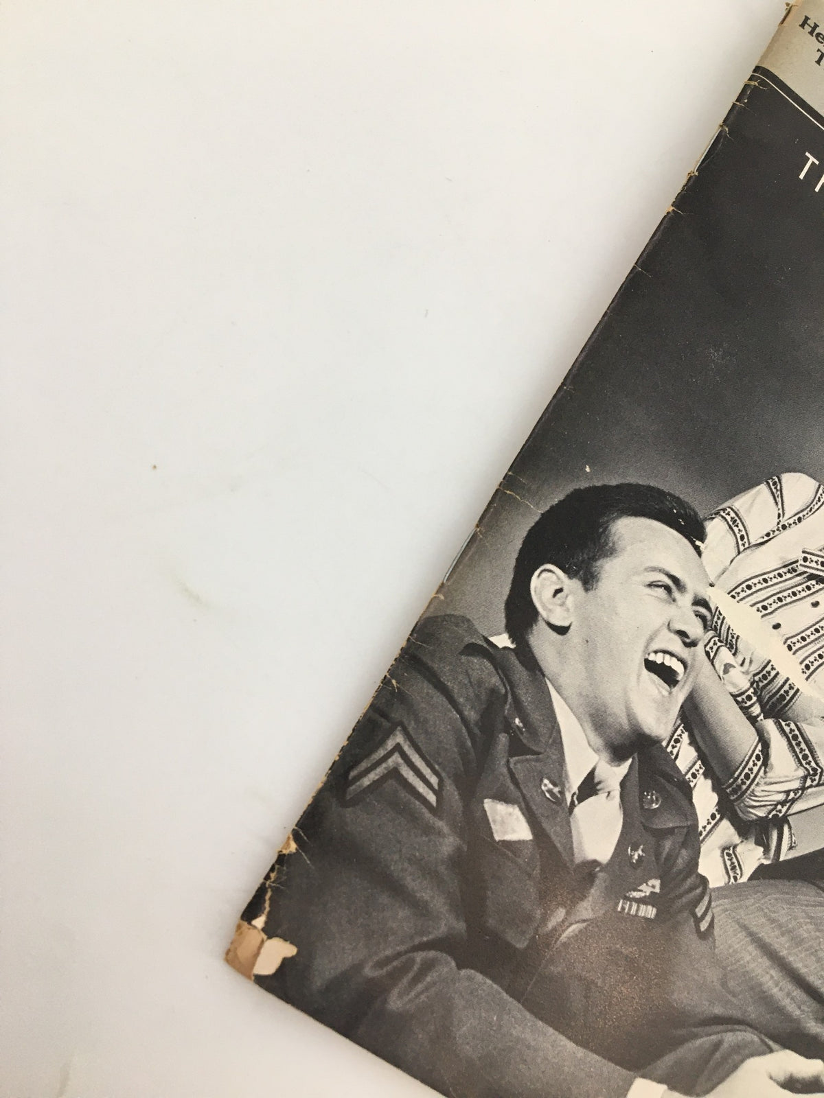 Close-up side view of the 1965 Playbill from Helen Hayes Theatre showcasing Jack Albertson in The Subject Was Roses, highlighting minor wear and character of the vintage piece.