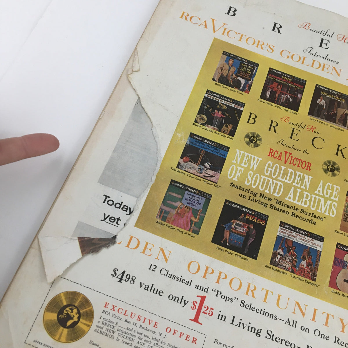 Back cover of Ladies' Home Journal Magazine September 1959 with an advertisement for RCA Victor's Golden Age of Sound Albums. The cover displays wear, including a torn corner.