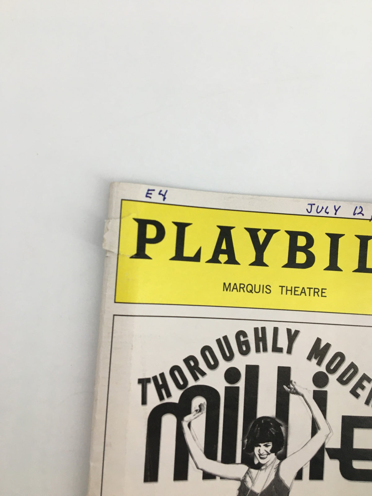 Close-up of the top of the 2003 Playbill, featuring Whoopi Goldberg in Thoroughly Modern Millie, highlighting the date and venue details.