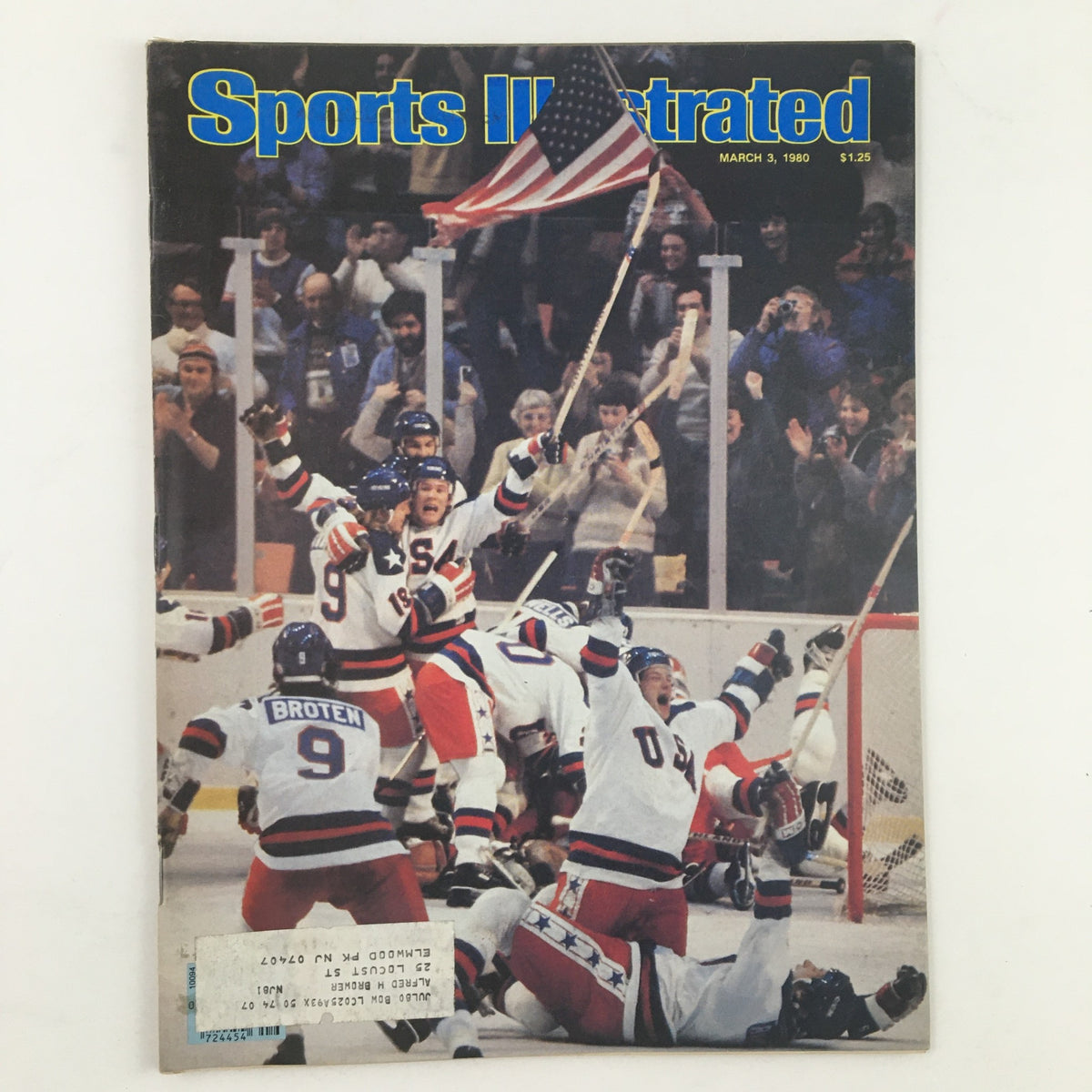Cover of Sports Illustrated Magazine from March 3, 1980, featuring the U.S. Hockey Team celebrating in the Winter Olympics with a crowd in the background.