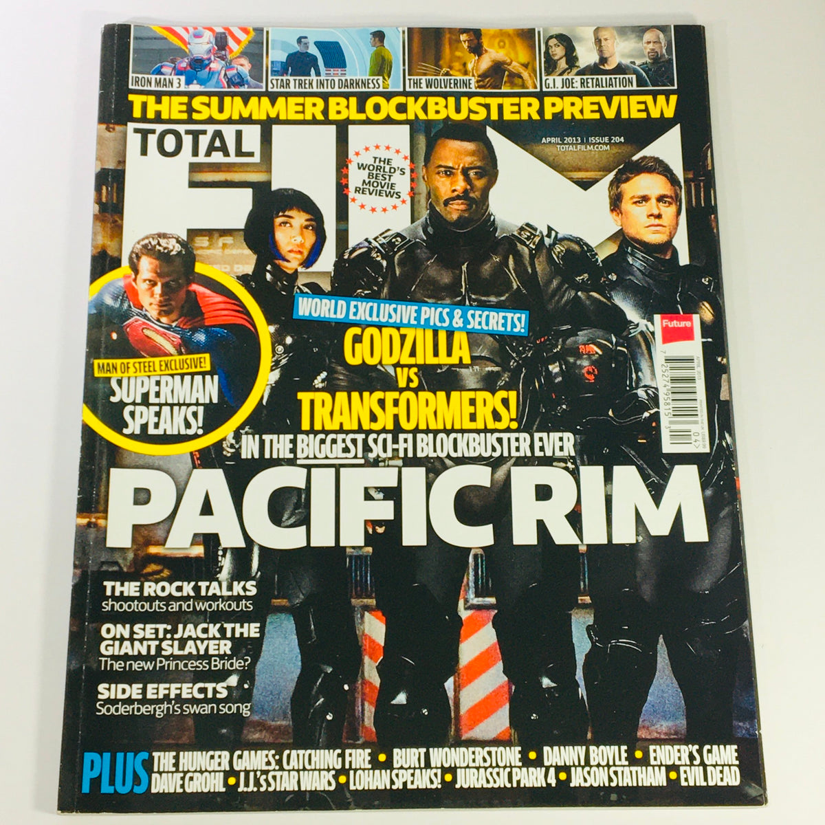 Total Film Magazine April 2013 #204 featuring Idris Elba and Charlie Hunnam on the cover, highlighting the summer blockbuster preview including movies like Pacific Rim and Godzilla.