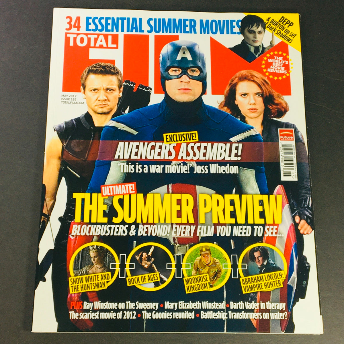 Total Film Magazine May 2012 cover featuring Jeremy Renner, Chris Evans, and Scarlett Johansson, showcasing blockbuster films and the Marvel Cinematic Universe.