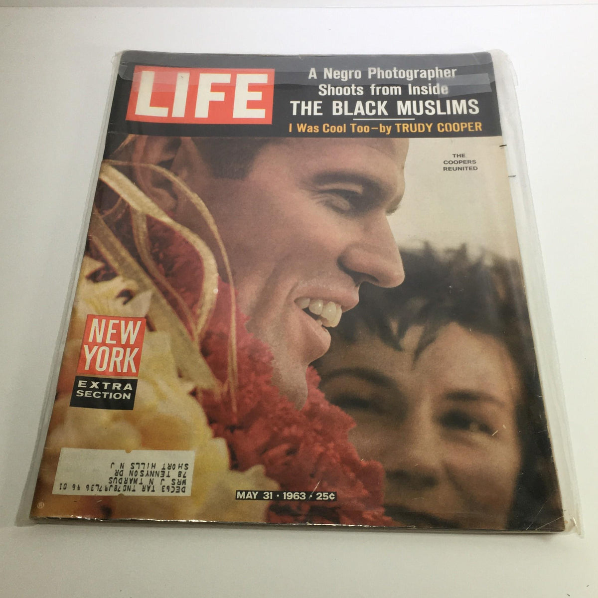 Cover of Life Magazine dated May 31, 1963, featuring the title 'The Black Muslims Shoots by a Negro Photographer'. Showcases a striking photograph of a man smiling alongside a woman, illustrating cultural context and significance of the 1960s.