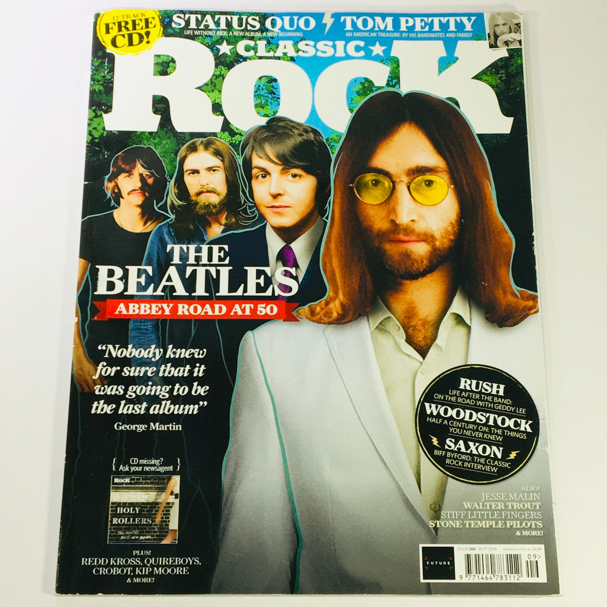Classic Rock Magazine September 2019 issue #266 featuring The Beatles on the cover, celebrating their Abbey Road anniversary with a colorful design and prominent photos of the band members.