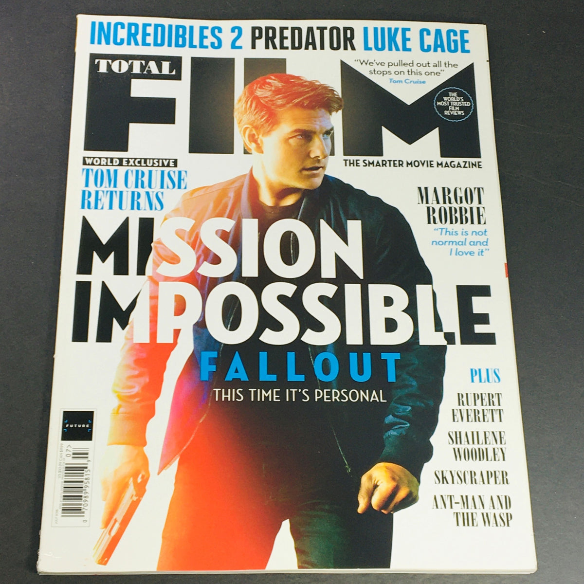 Cover of Total Film Magazine July 2018 featuring Tom Cruise and Margot Robbie, highlighting 'Mission Impossible: Fallout' with a tagline 'This Time It's Personal'.
