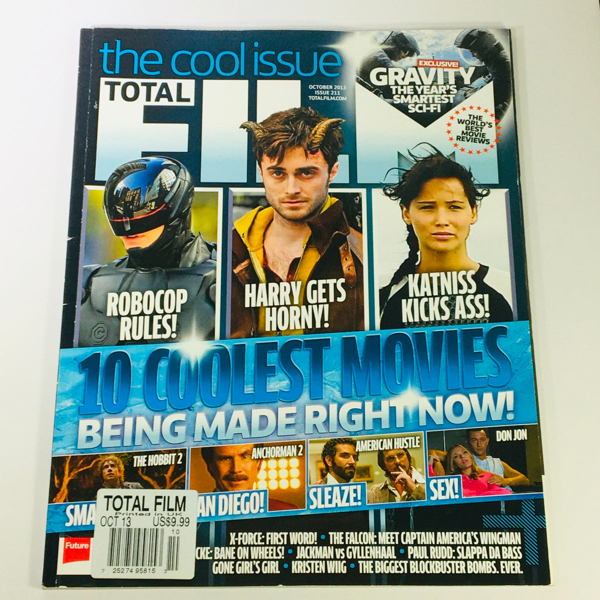 Total Film Magazine October 2013 #211 cover featuring Daniel Radcliffe and Jennifer Lawrence, showcasing articles on the coolest movies of the year including Gravity, The Hobbit, and American Hustle.
