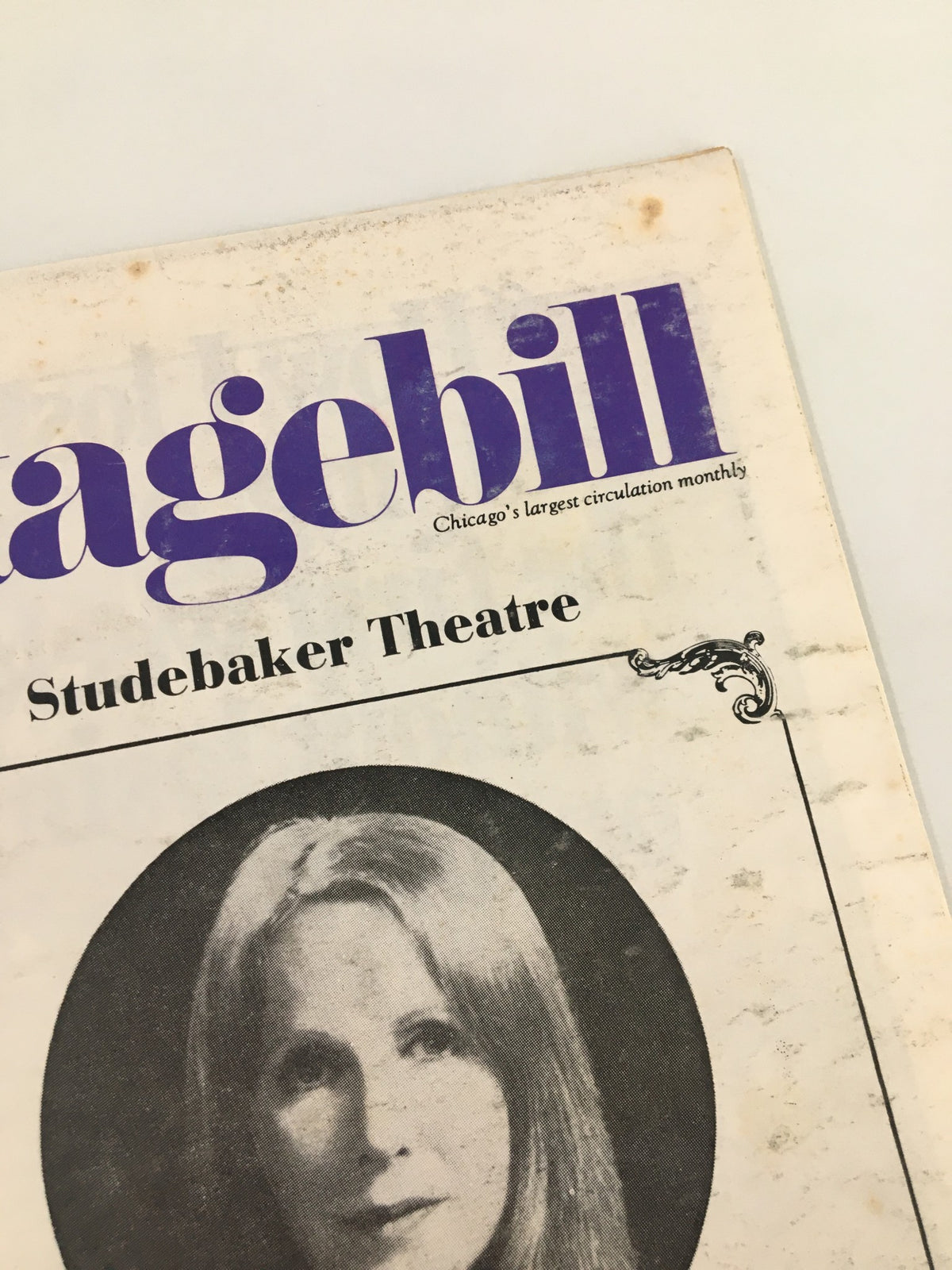 1976 Stagebill featuring Emily Dickinson in The Belle of Amherst from Studebaker Theatre, showing the magazine cover with title and black and white portrait.