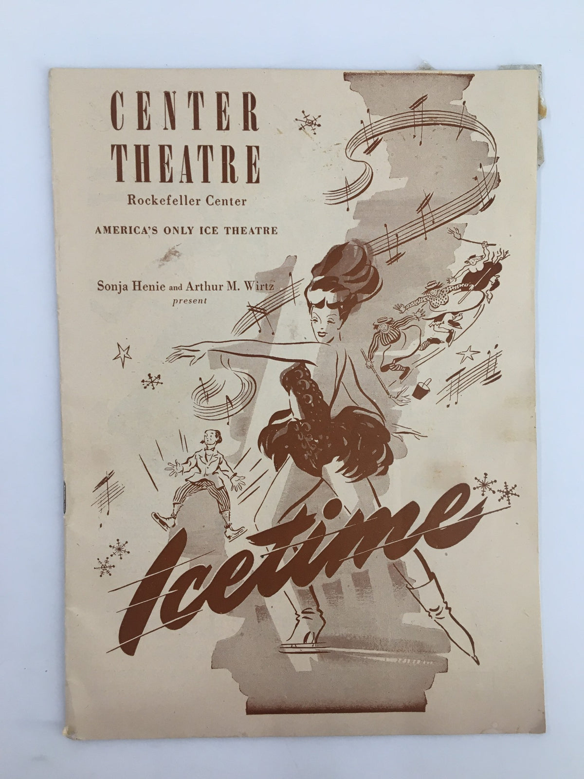 1947 Center Theatre program cover for Icetime featuring Skippy Baxter and Paul Castle at Rockefeller Center, showcasing vintage performance artwork.