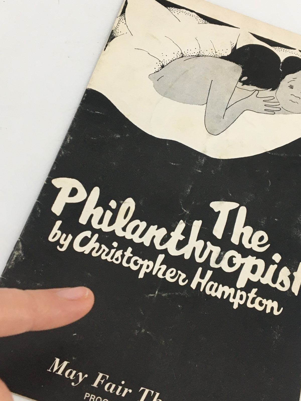 Close-up of the front cover of the 1970 May Fair Theatre Programme for The Philanthropist by Christopher Hampton, highlighting the title and illustrated design.