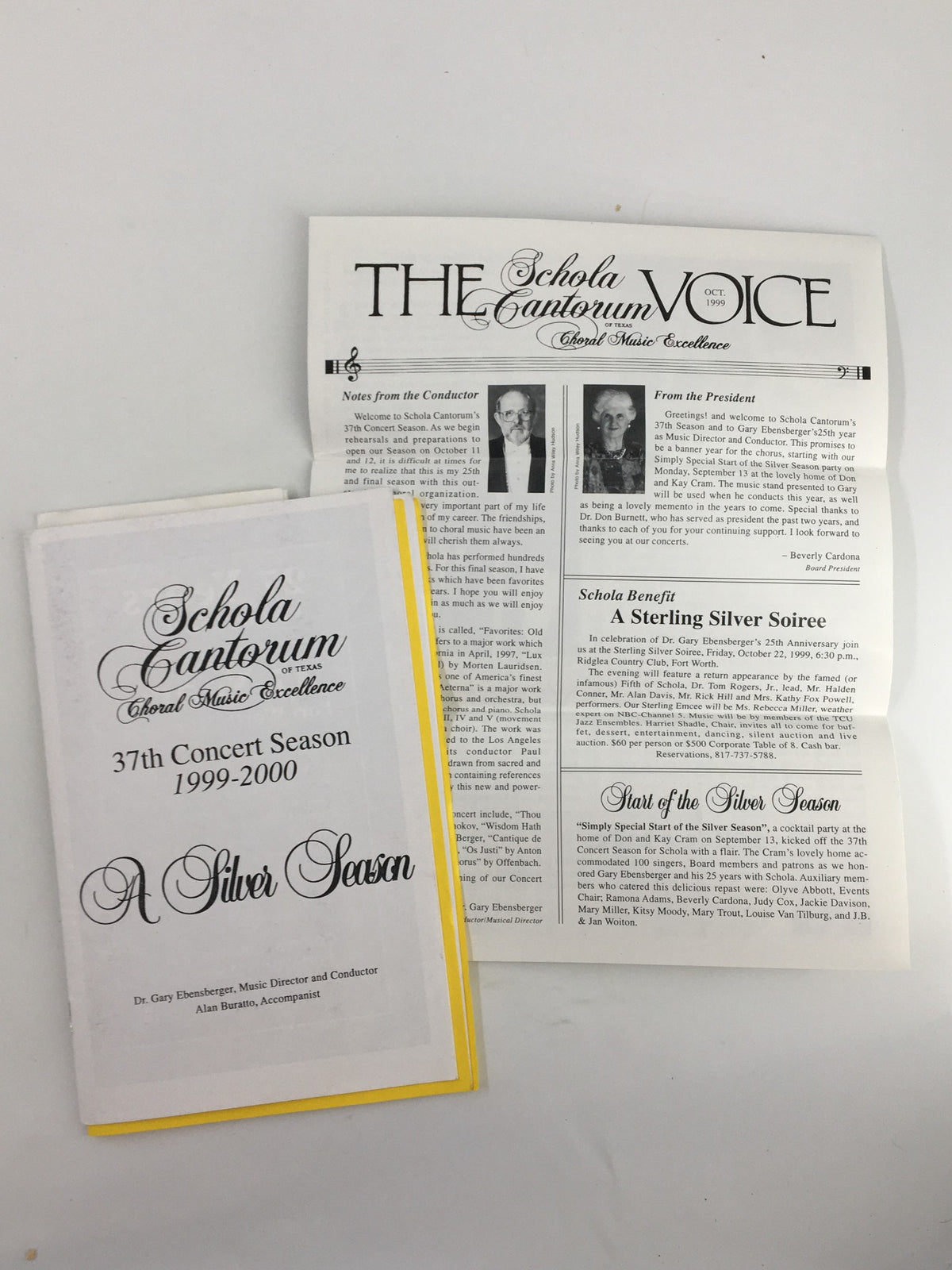 1999 Schola Cantorum Choral Music Excellence A Silver Season 1999-2000 program cover featuring a yellow spine and informational article on concert season.