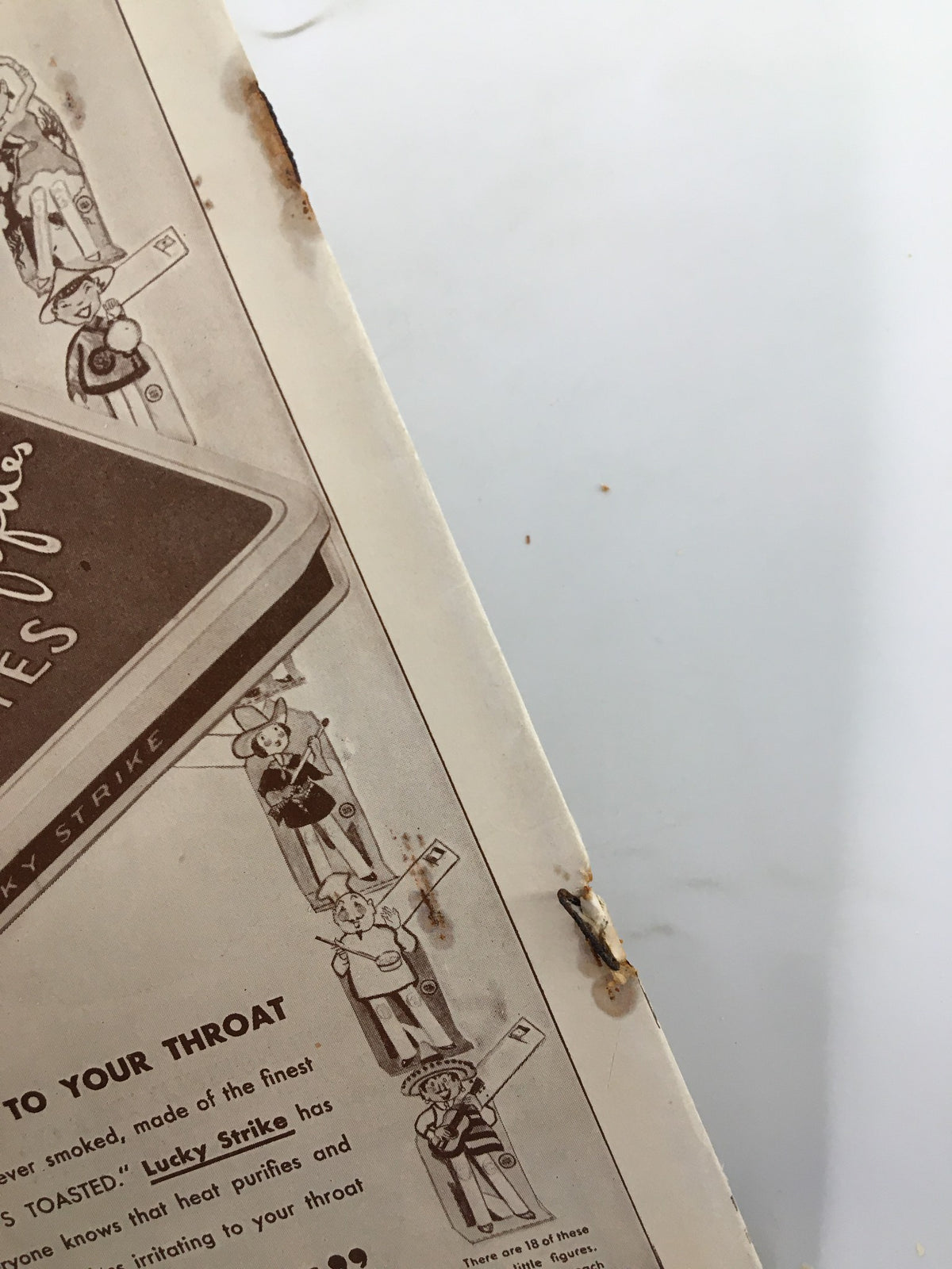 Inside of the 1930 Biltmore Theatre magazine featuring a vintage advertisement for Lucky Strike cigarettes, illustrating the product's appeal with illustrations and claims.