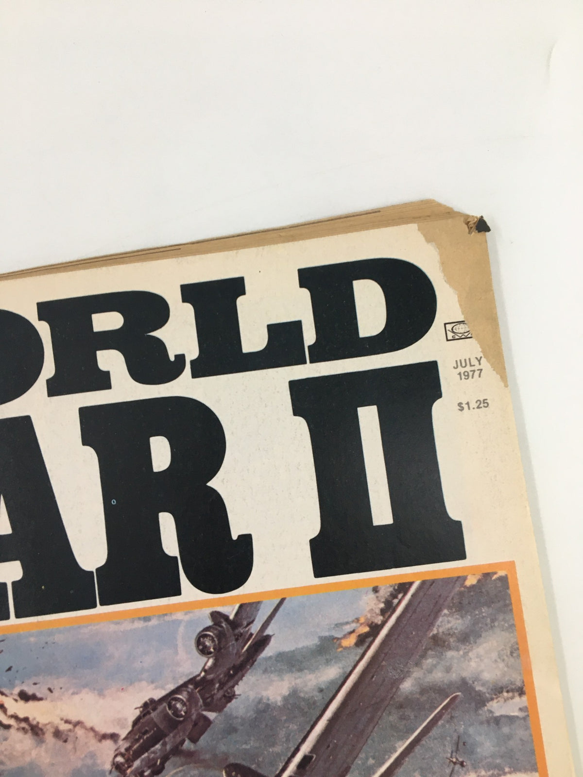 Close-up of the top corner of the VTG World War II Magazine July 1977 cover showing the title 'WORLD WAR II' and the publication date.