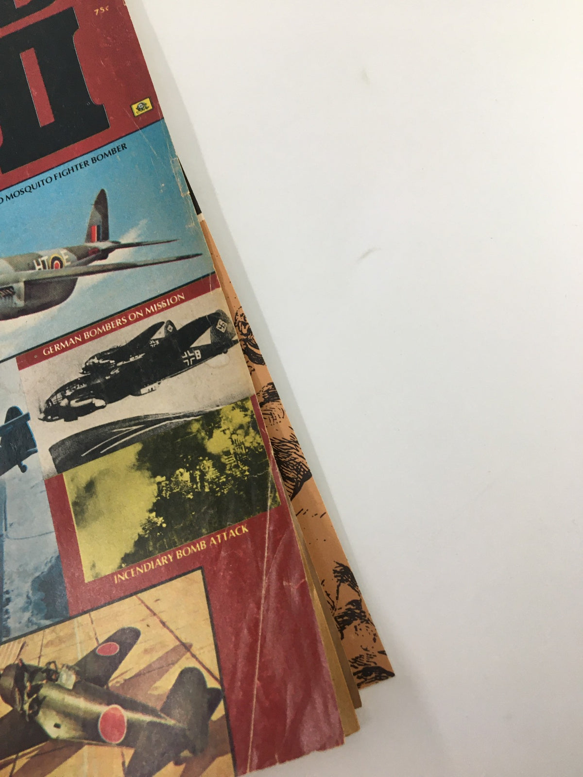 Side view of the January 1974 vintage World War II Magazine highlighting the DeHavilland Mosquito Fighter with visible age-related wear.