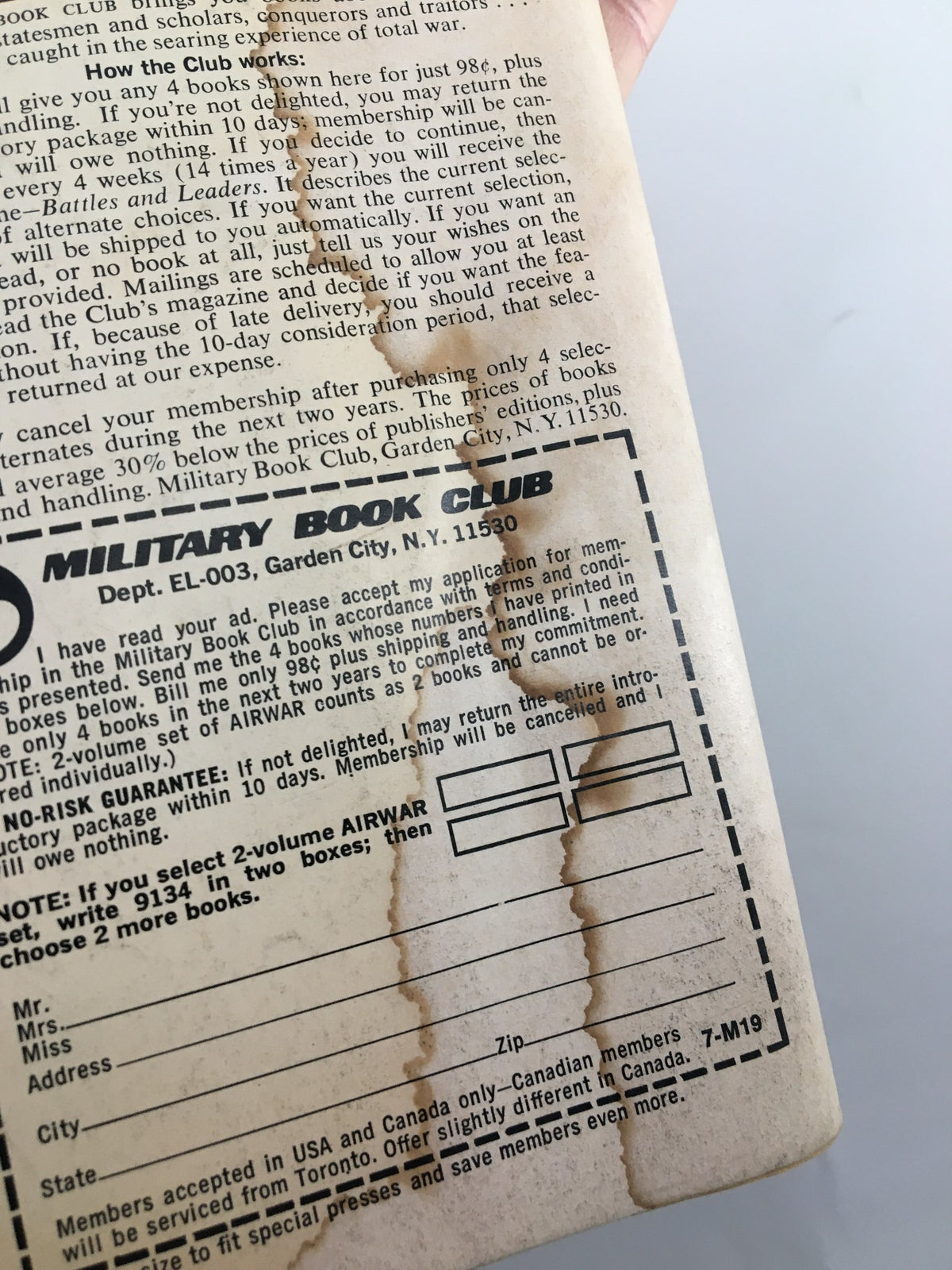 Back cover of the VTG World War II Magazine April 1974, featuring details about a military book club membership offer.