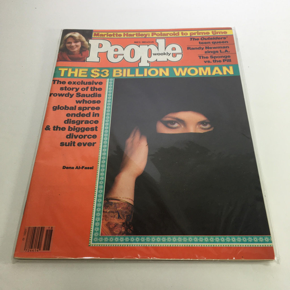 Cover image of People Magazine, May 2, 1983, featuring Dena Al-Fassi, titled 'The $3 Billion Woman.' The magazine showcases a striking photograph of a woman in traditional attire, capturing the essence of the early '80s with headlines highlighting global events and cultural dynamics.