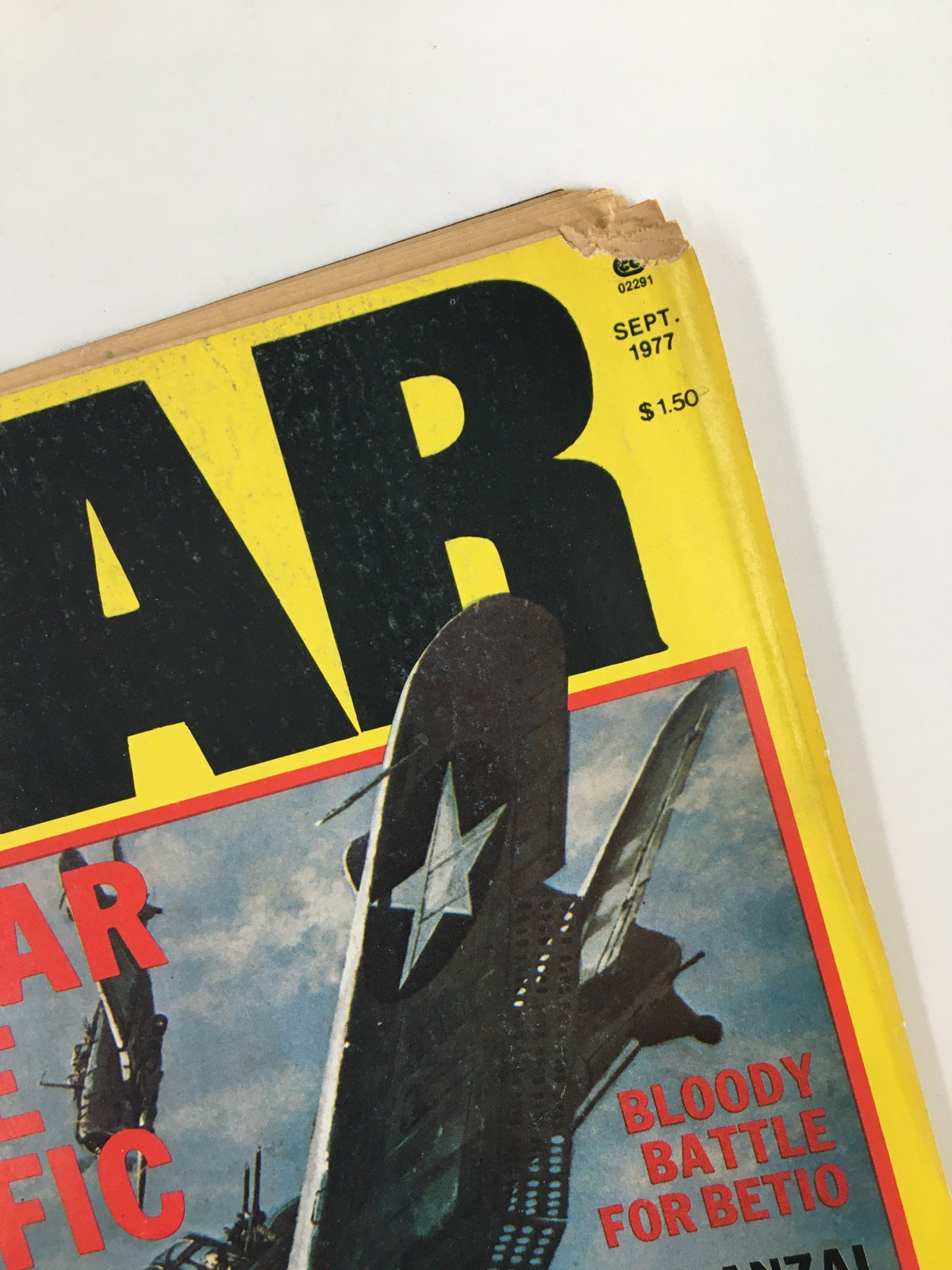 Another angle of the cover of VTG True War Magazine September 1977, highlighting the magazine title and wear consistent with its vintage status.